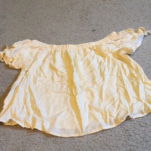 Light yellow off the shoulder shirt